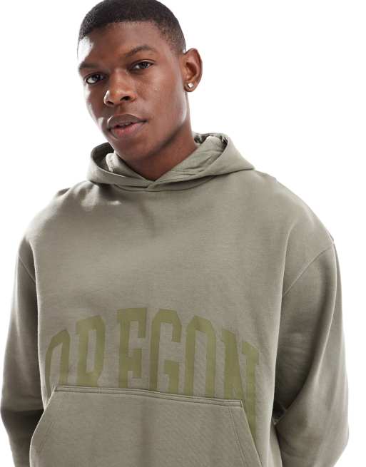 ASOS DESIGN – Oversize-Kapuzenpullover in Khaki mit kastigem Schnitt und Frontprint