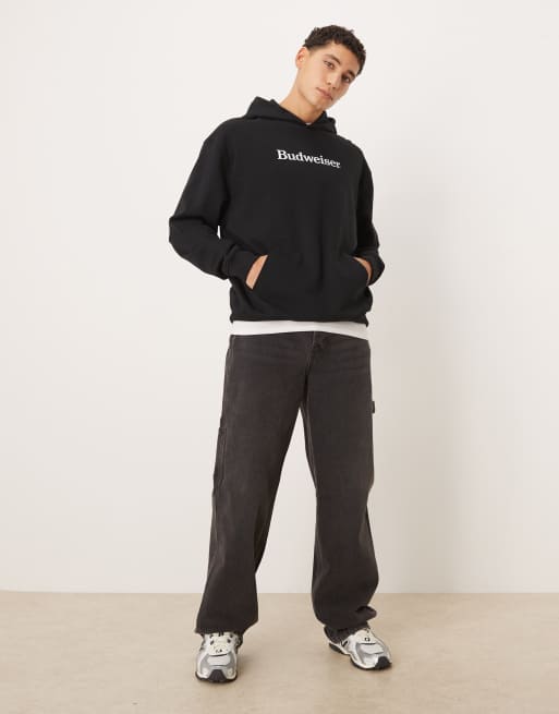 ASOS DESIGN – Oversize-Kapuzenpullover in Schwarz mit Budweiser-Print, 3 von 5