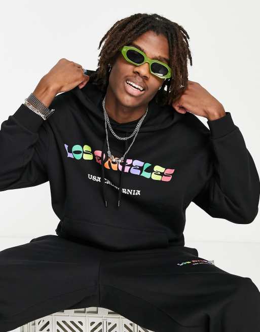 ASOS DESIGN – Oversize-Kapuzenpullover in Schwarz mit buntem „Los Angeles“-Print, Kombiteil