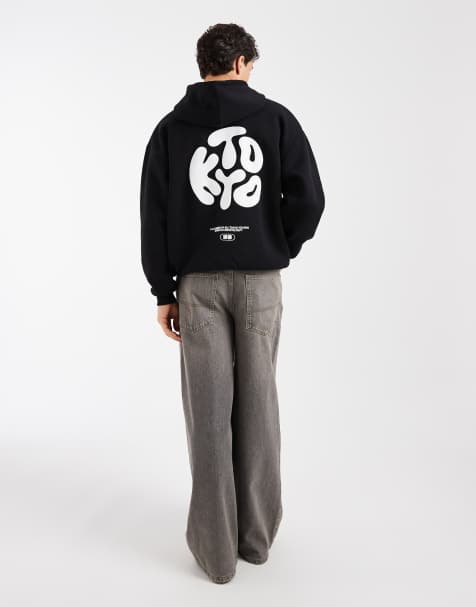 ASOS DESIGN – Oversize-Kapuzenpullover in Schwarz mit City-Print - view 1