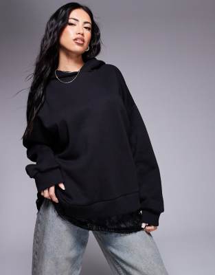 ASOS DESIGN - Oversize-Kapuzenpullover in Schwarz mit Spitzeneinsatz