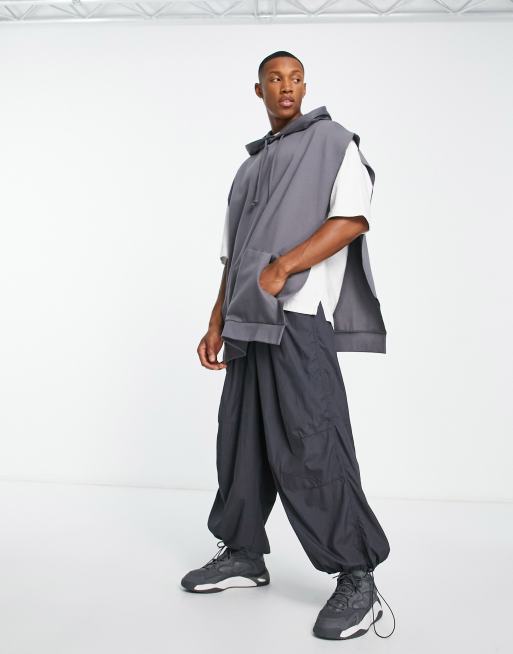 ASOS DESIGN – Oversize-Kapuzenpullover in verwaschenem Schwarz mit Seitenschlitzen