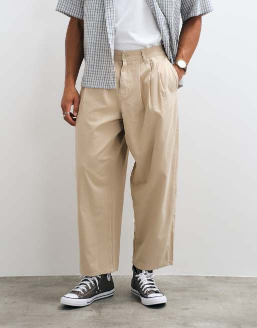 ASOS DESIGN Oversize konisch zulaufende Hose in Beige mit Bundfalten, 3 von 5