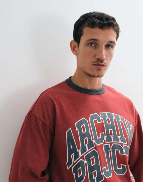 ASOS DESIGN oversize långärmad ringer-t-shirt med text i tvättad röd - view 1