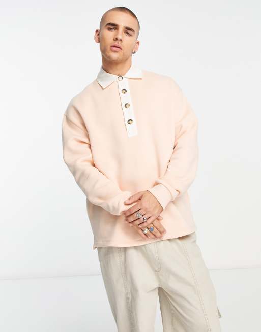 ASOS DESIGN – Oversize-Polo-Sweatshirt in Rosa mit Knopfleiste am Ausschnitt