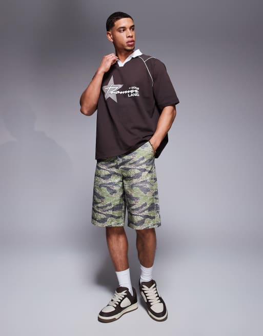 ASOS DESIGN – Oversize-Polohemd in Braun mit Sportgrafik und Airtex-Einsätzen , 3 von 4