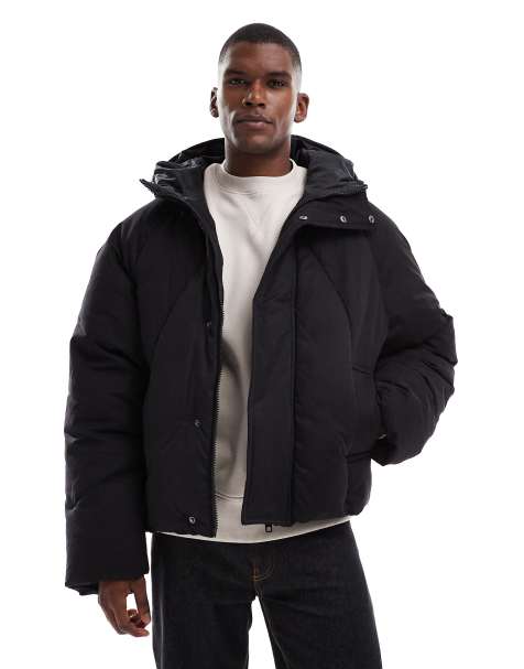 ASOS DESIGN – Oversize-Pufferjacke in Schwarz mit Kapuze - view 1