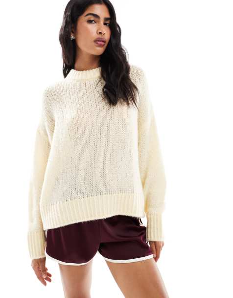 ASOS DESIGN – Oversize-Pullover in Buttermilchgelb mit Rundhalsausschnitt und weitmaschigem Strickmuster - view 1