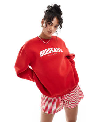 ASOS DESIGN - Oversize-Pullover in Rot mit „Bordeaux"-Schriftzug