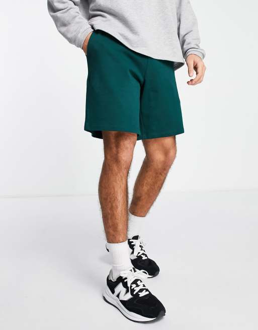 ASOS DESIGN – Oversize-Shorts aus Jersey in Dunkelgrün
