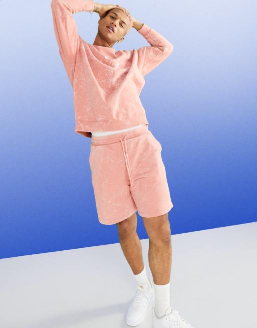ASOS DESIGN – Oversize-Shorts aus Jersey in pfirsichfarbener Acid-Waschung, Kombiteil