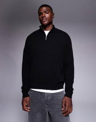 Oversize-Strickpullover aus Lammwolle in Schwarz mit kurzem Reißverschluss Schwarz M