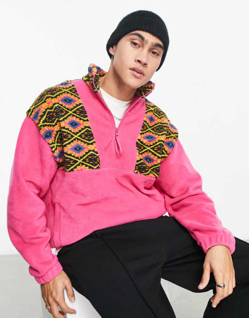 ASOS DESIGN – Oversize-Sweatshirt aus Fleece in Rosa mit Azteken-Farbblockdesign und kurzem Reißverschluss