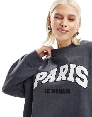 ASOS DESIGN - Oversize-Sweatshirt in Anthrazit meliert mit „Paris"-Grafik-Grau