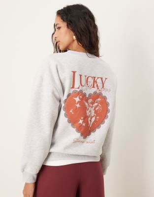 ASOS DESIGN - Oversize-Sweatshirt in Grau meliert mit „Lucky in Love"-Engelchengrafik