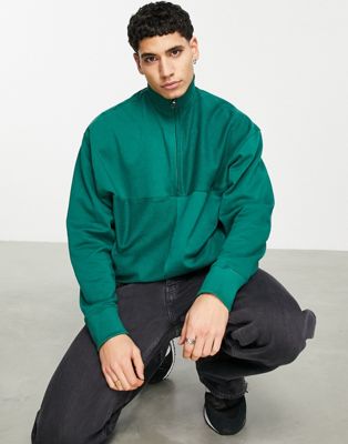 ASOS DESIGN – Oversize-Sweatshirt in Grün mit Halbreißverschluss und Einsätzen