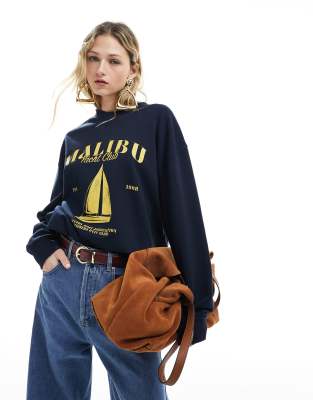 ASOS DESIGN - Oversize-Sweatshirt in Marineblau mit „Malibu Yacht"-Grafikprint