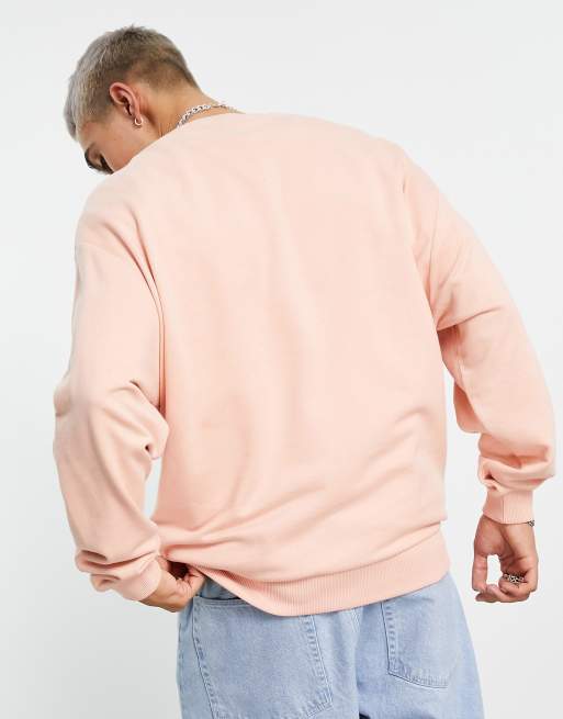 ASOS DESIGN Oversize Sweatshirt in rosa Waschung ASOS