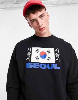 ASOS DESIGN – Oversize-Sweatshirt in Schwarz mit „Seoul“- und Flaggenprint