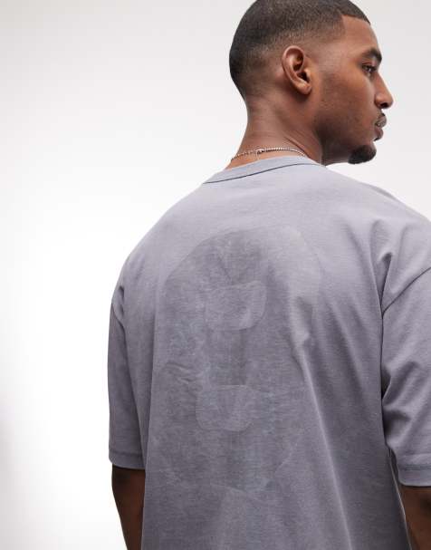 ASOS DESIGN – Oversize-T-Shirt aus schwerem Stoff in grauer Waschung mit 8 Grafikprint - view 1