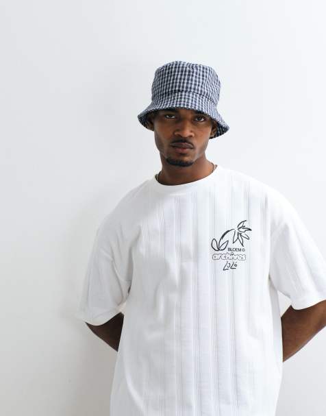 ASOS DESIGN Oversize-T-Shirt aus schwerem, strukturiertem Stoff mit Blumenmotiv auf der Brust in Weiß - view 1