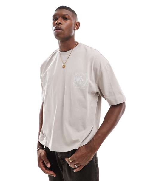 ASOS DESIGN – Oversize-T-Shirt in Beige mit kastigem Schnitt und Print auf der Brust - view 1
