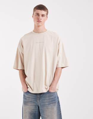 Oversize-T-Shirt in Beige mit Text-Grafikprint-Neutral Neutral XL