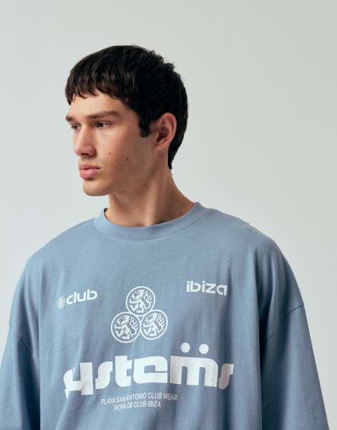 ASOS DESIGN – Oversize-T-Shirt in Blau mit Fußball-Grafik - view 1