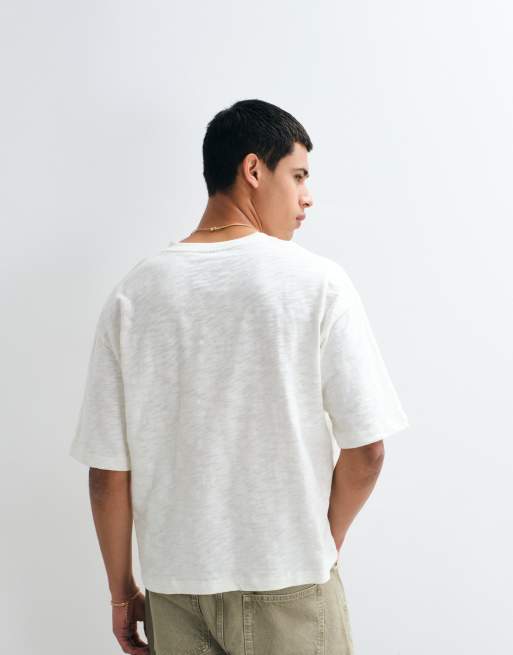 ASOS DESIGN Oversize-T-Shirt in Boxy-Passform mit V-Ausschnitt in strukturierter Weißoptik, 4 von 5