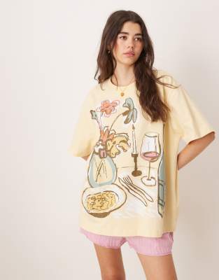 ASOS DESIGN - Oversize-T-Shirt in Buttermilchgelb mit Dinner Party-Grafikprint