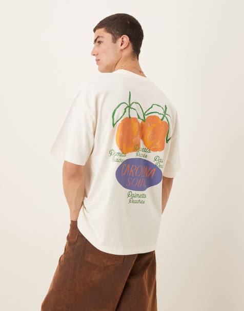 ASOS DESIGN – Oversize-T-Shirt in Creme mit Pfirsich-Grafik - view 1