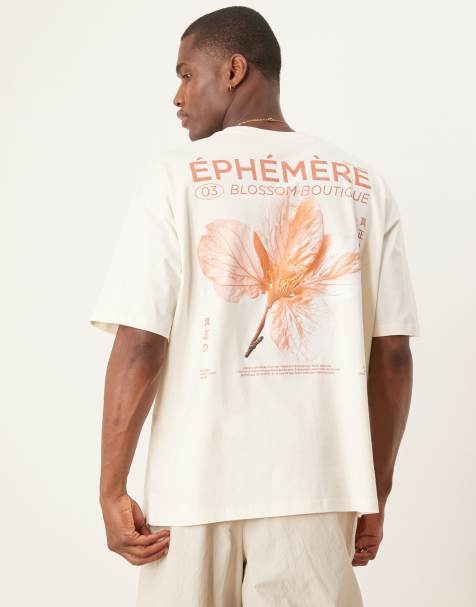 ASOS DESIGN – Oversize-T-Shirt in Cremeweiß mit floralem Grafikprint - view 1