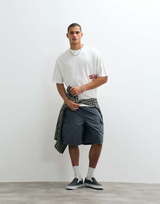 ASOS DESIGN – Oversize-T-Shirt in Cremeweiß mit großem Textprint, 3 von 5