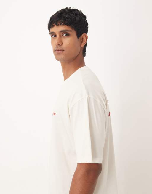 ASOS DESIGN – Oversize-T-Shirt in Cremeweiß mit Street-Prints, 4 von 5