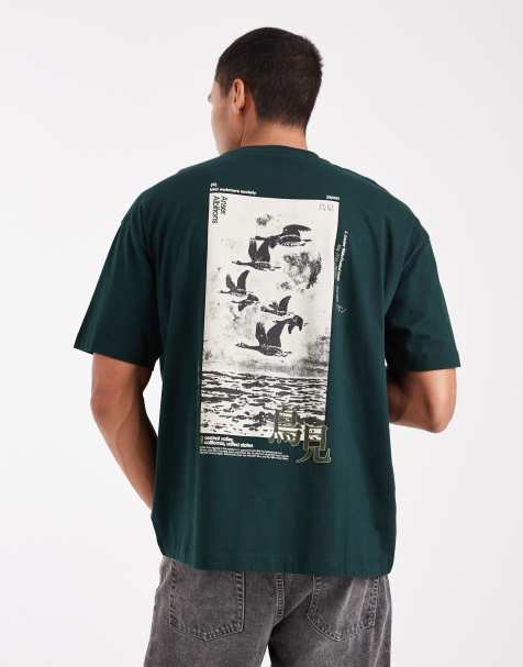 ASOS DESIGN – Oversize-T-Shirt in Dunkelgrün mit Souvenir-Print - view 1