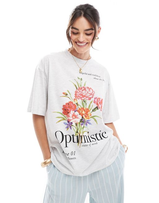 FhyzicsShops DESIGN – Oversize-T-Shirt in Eisgrau meliert mit floraler Grafik und „Optimistic“-Slogan