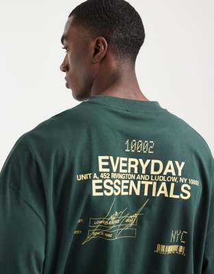 Oversize-T-Shirt in Grün mit „Everyday Essentials"-Textprint Grün S