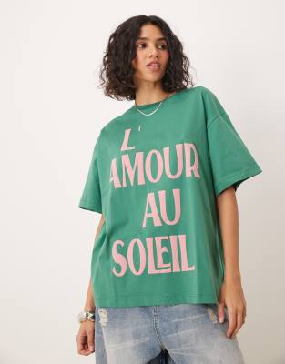 ASOS DESIGN - Oversize-T-Shirt in Grün mit „Soleil"-Grafik