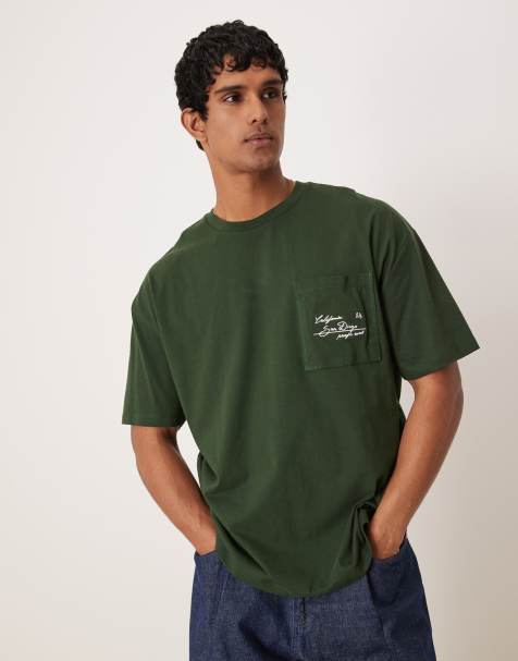 ASOS DESIGN – Oversize-T-Shirt in Grün mit Tasche mit City-Stickerei - view 1