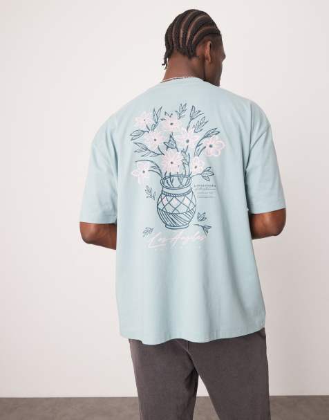ASOS DESIGN – Oversize-T-Shirt in Hellblau mit Blumenprint - view 1