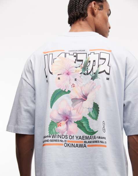 ASOS DESIGN – Oversize-T-Shirt in Hellblau mit Blumenprint - view 1