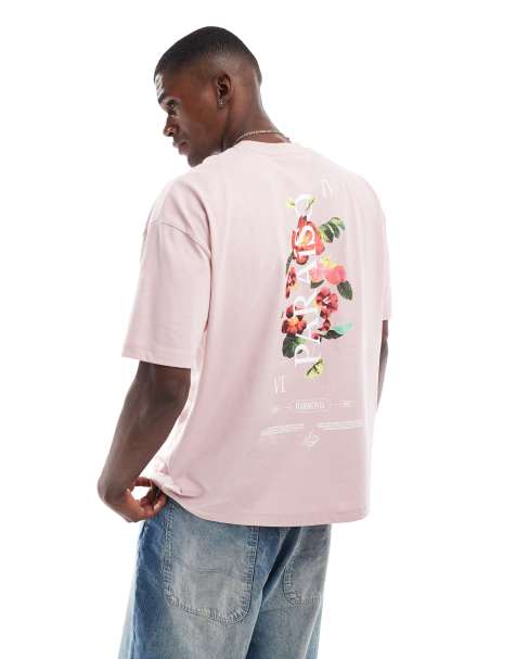 ASOS DESIGN – Oversize-T-Shirt in Hellrosa mit Blumengrafik - view 1