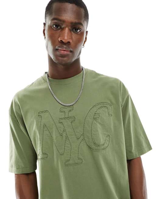 FhyzicsShops DESIGN – Oversize-T-Shirt in Khaki mit Applikationsprint in Used-Optik