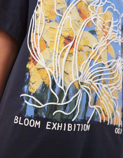 ASOS DESIGN – Oversize-T-Shirt in Marineblau mit gelbem Blumen-Grafikprint, 2 von 4