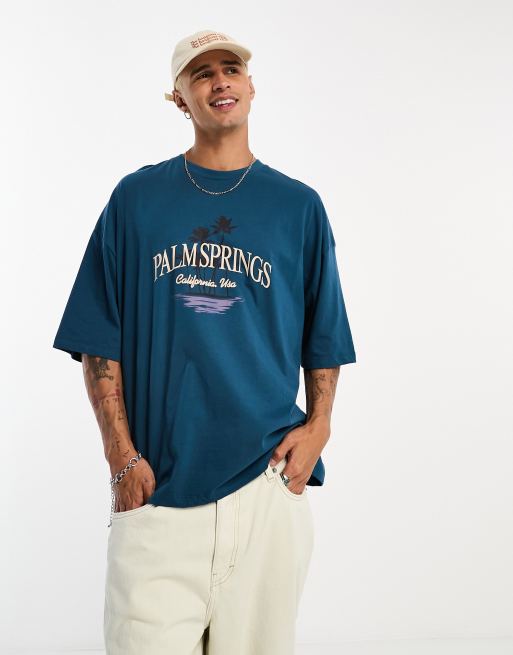 ASOS DESIGN – Oversize-T-Shirt in Marineblau mit „Palm Springs“-Grafikprint