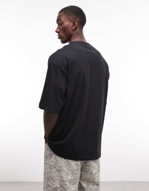 ASOS DESIGN – Oversize-T-Shirt in Schwarz mit Brasil-Fußball-Grafik, 5 von 5