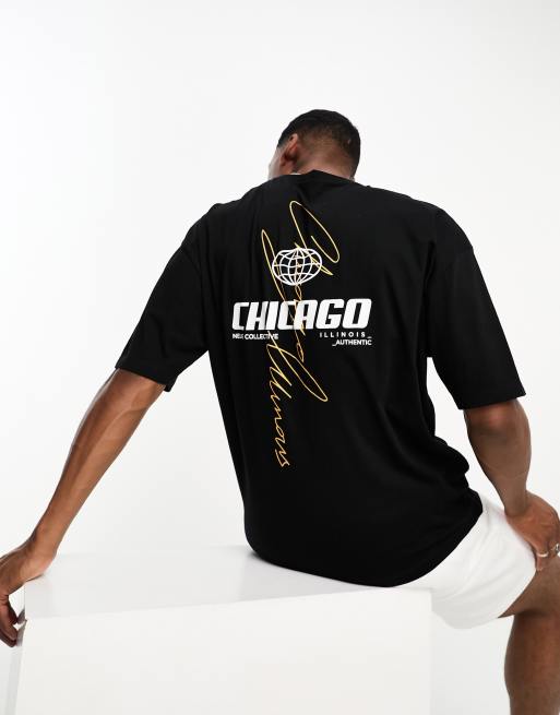 ASOS DESIGN – Oversize-T-Shirt in Schwarz mit City-Print entlang der Wirbelsäule