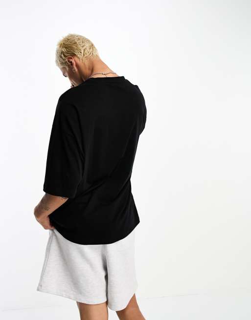 ASOS DESIGN – Oversize-T-Shirt in Schwarz mit Linienprint in gezeichneter Optik, 2 von 4