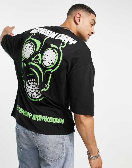 ASOS DESIGN – Oversize-T-Shirt in Schwarz mit neongrünem „Green Day“-Print hinten