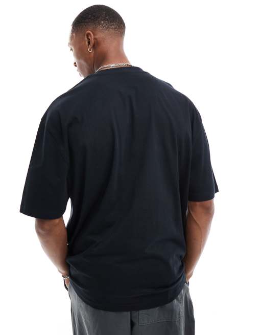 ASOS DESIGN – Oversize-T-Shirt in Schwarz mit offener-Mund-Print auf der Brust, 2 von 4